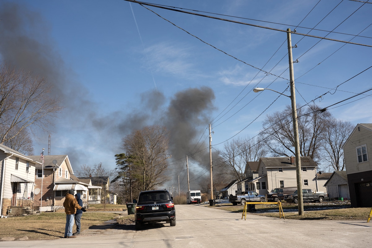 Smoke rises from a derailed Norfolk Southern Railway cargo train in East Palestine, Ohio