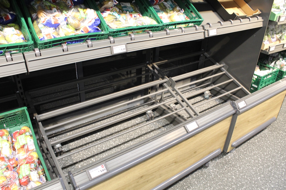 An empty vegetable shelf at a supermarket in London