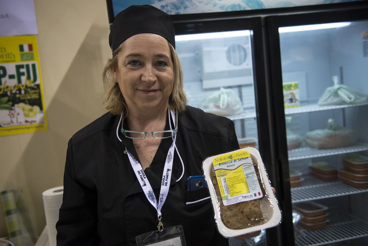 A producer of vegan “steak” made from seitan, a high-protein wheat gluten, displays the product at the Vegan World Fair in Turin, Italy
