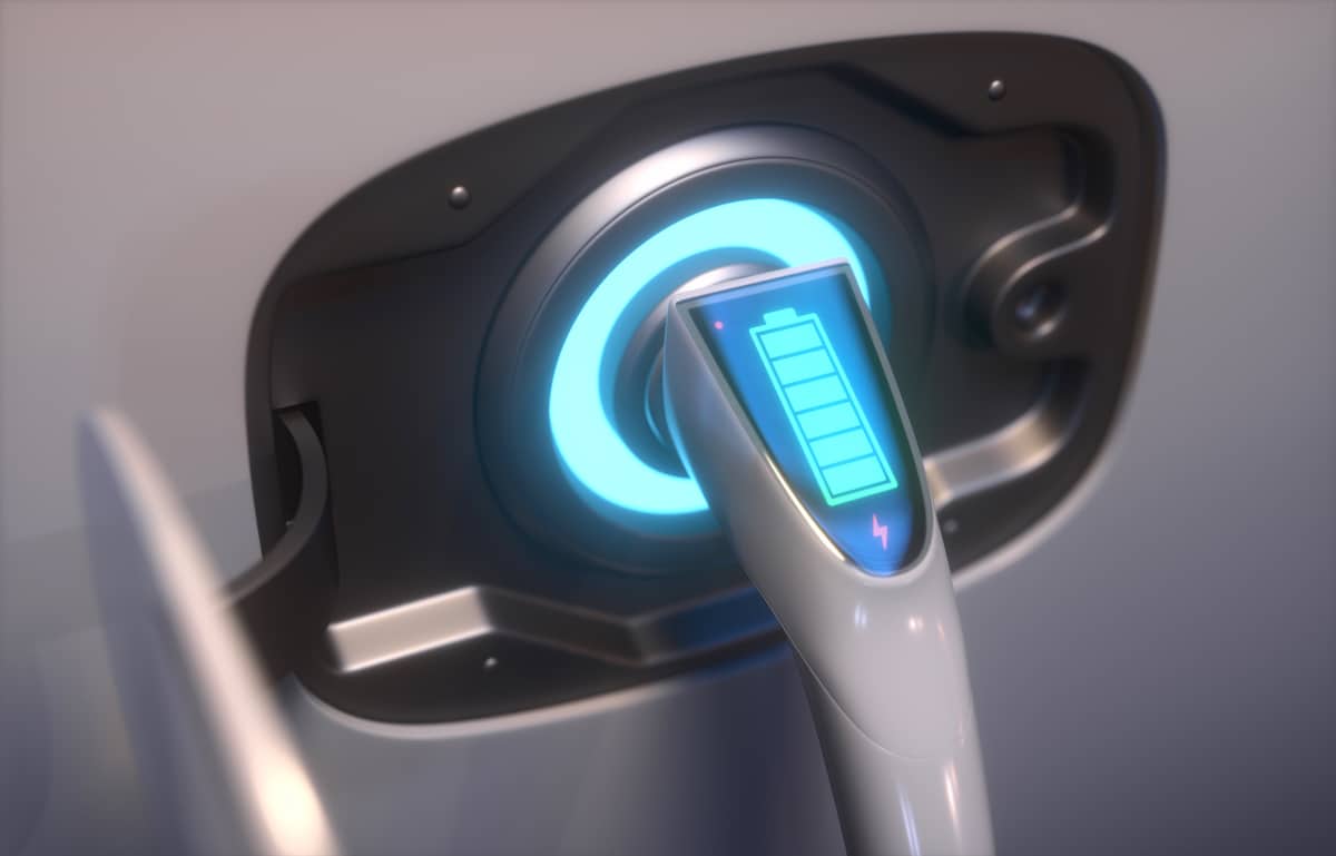 Closeup of the charging port of a fully charged electric car