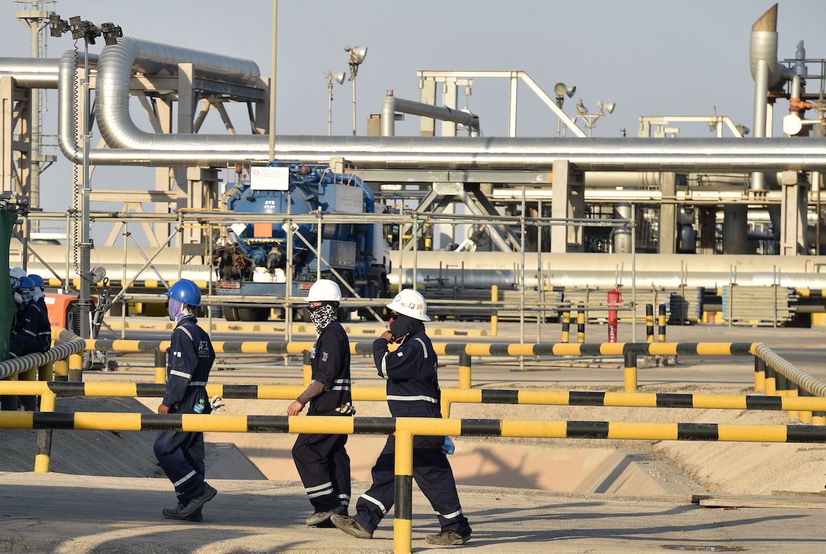 Employees of Aramco oil company work in Saudi Arabia's Abqaiq oil processing plant