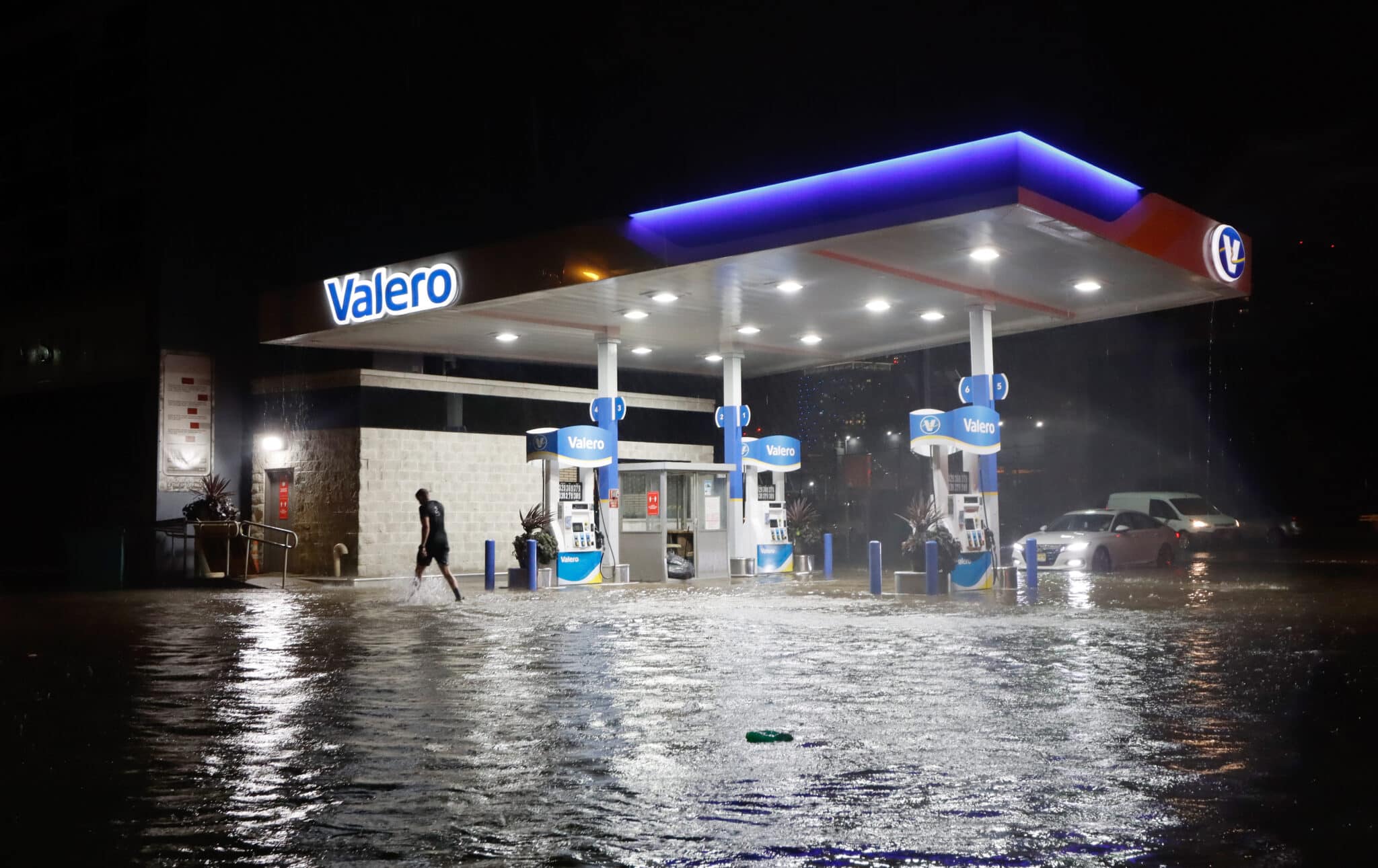 A Valero gas station in the rain.