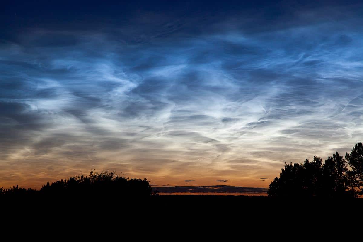 Noctilucent clouds in Earth's mesosphere above Edmonton, Alberta, Canada