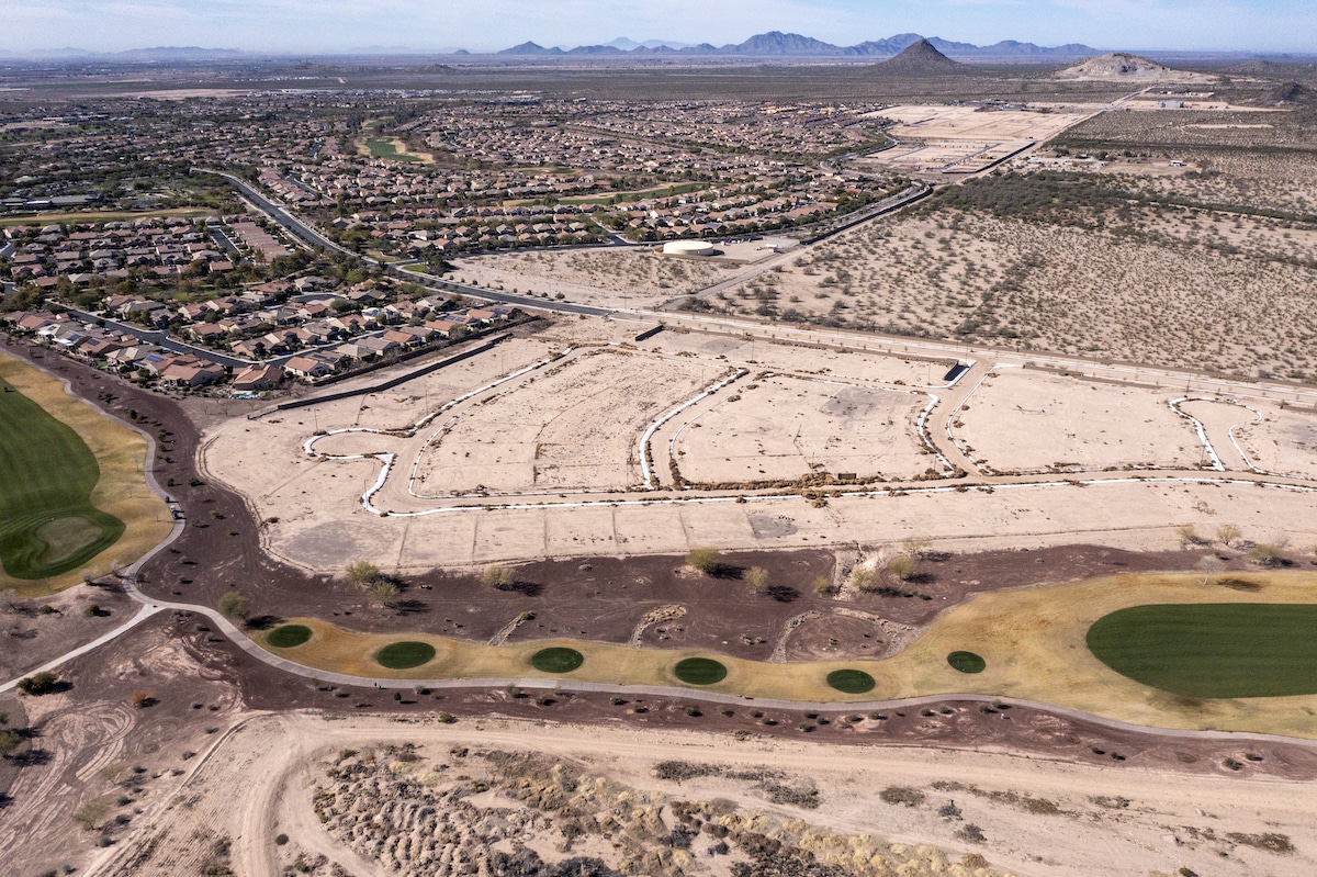 Aerial view of new homes and more planned along a golf course in Florence, Arizona, a suburb of Phoenix