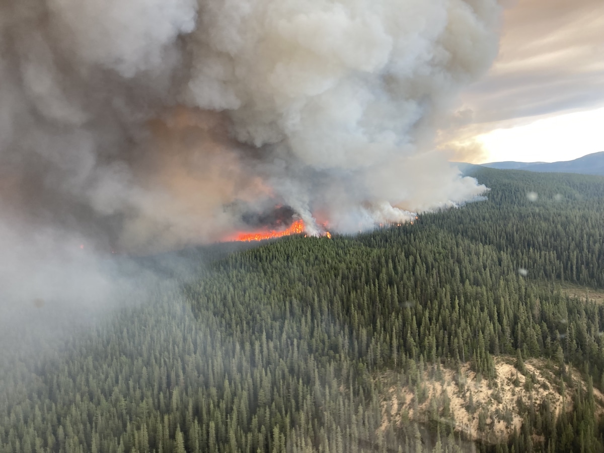 An aerial view of wildfires at Tatkin Lake in British Columbia, Canada