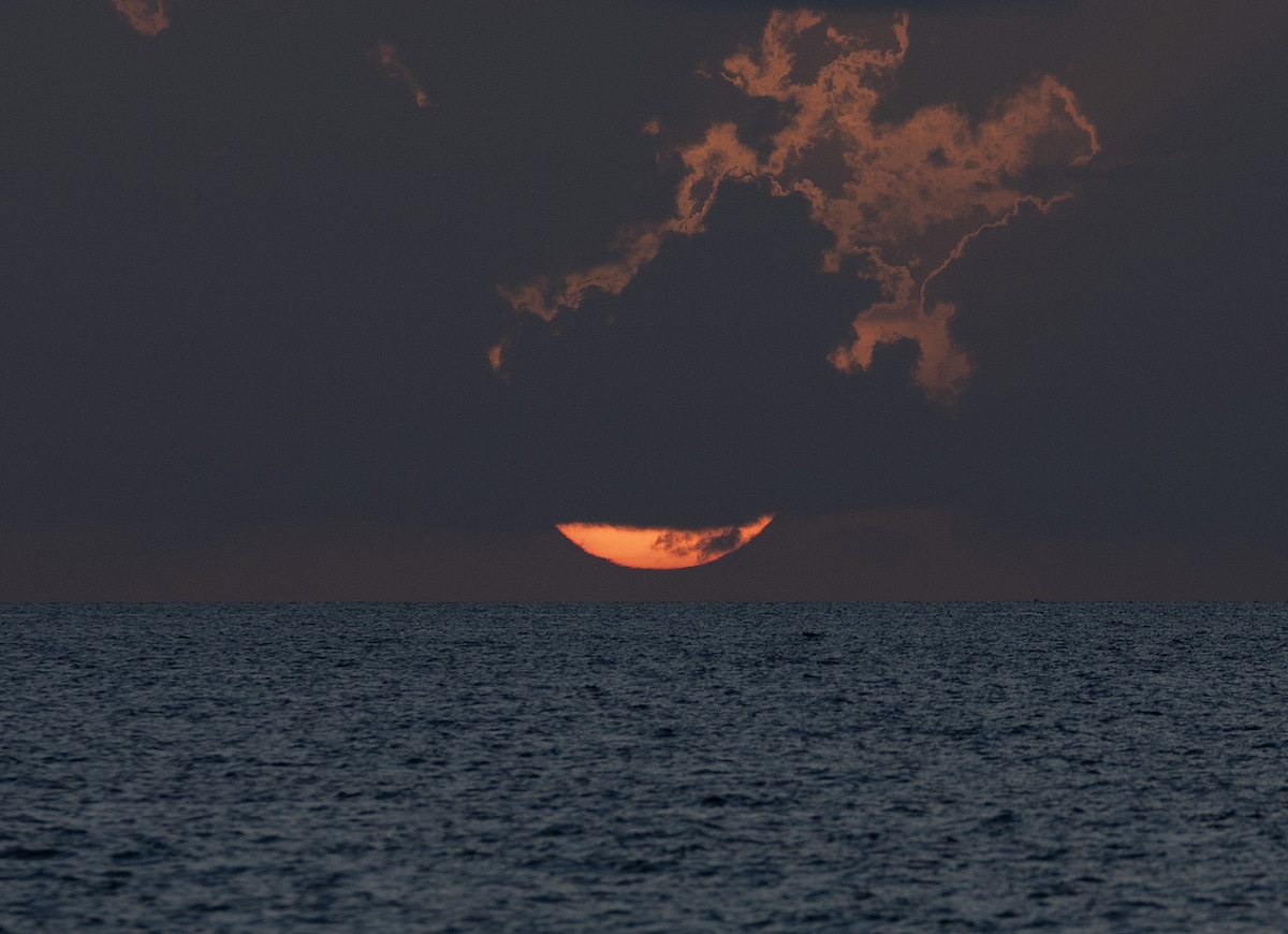 The sun rises over the Atlantic Ocean in Miami Beach, Florida