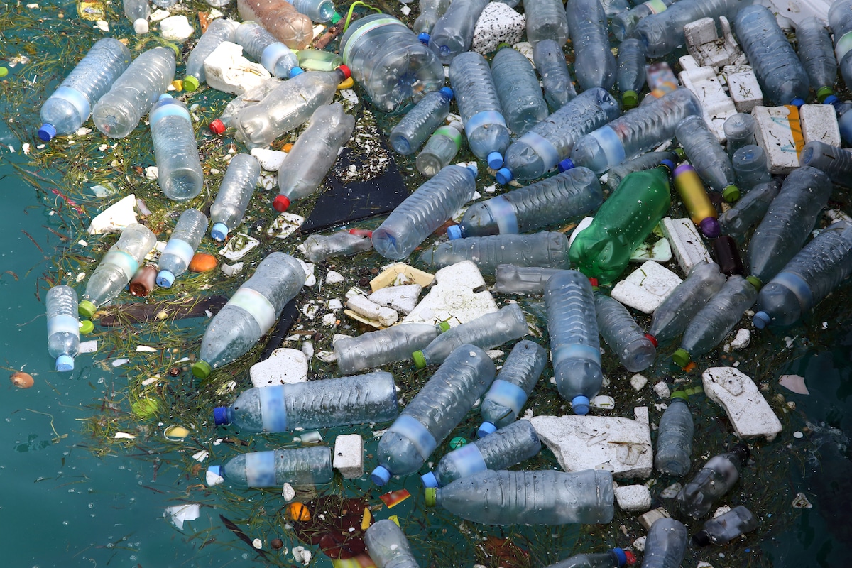 Plastic bottles and polystyrene polluting Hinnavaru Harbour, Maldives, Indian Ocean