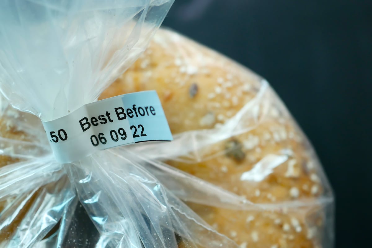 A "best before" date label on a bread packet