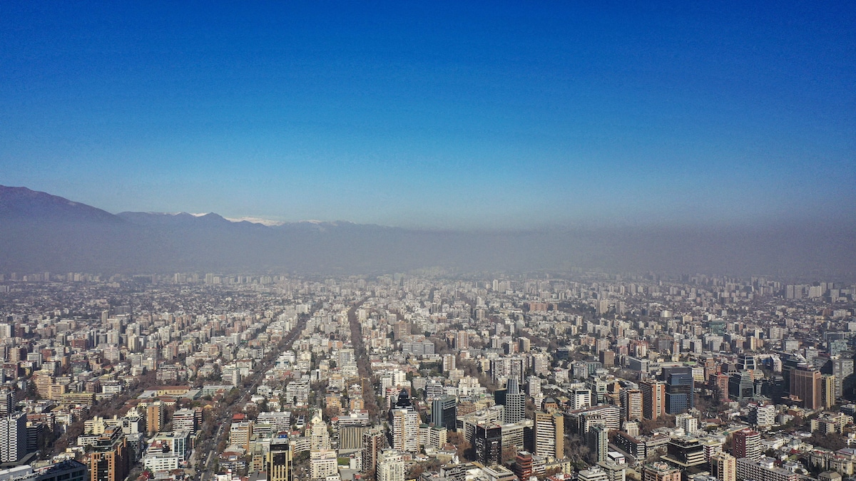 Aerial view of the city of Santiago, Chile, with smog and high temperatures in August
