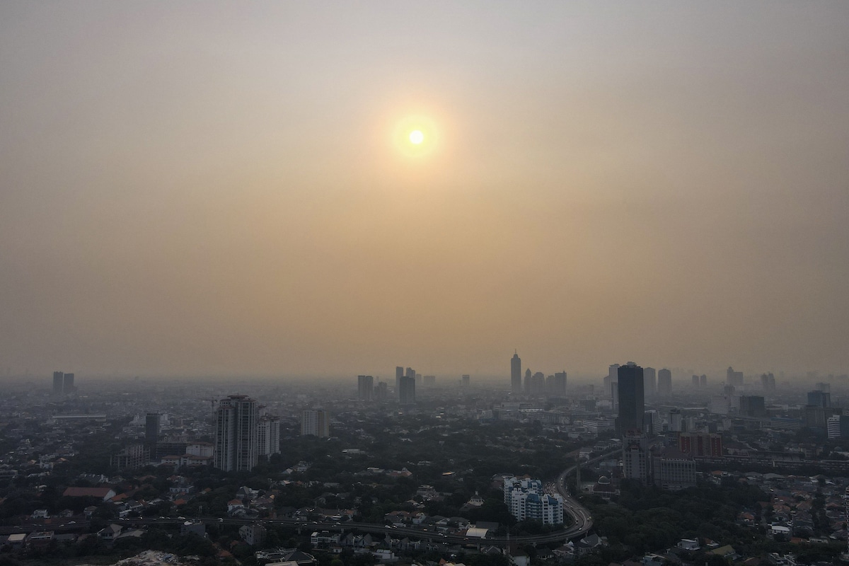 The Jakarta, Indonesia skyline with poor air quality levels
