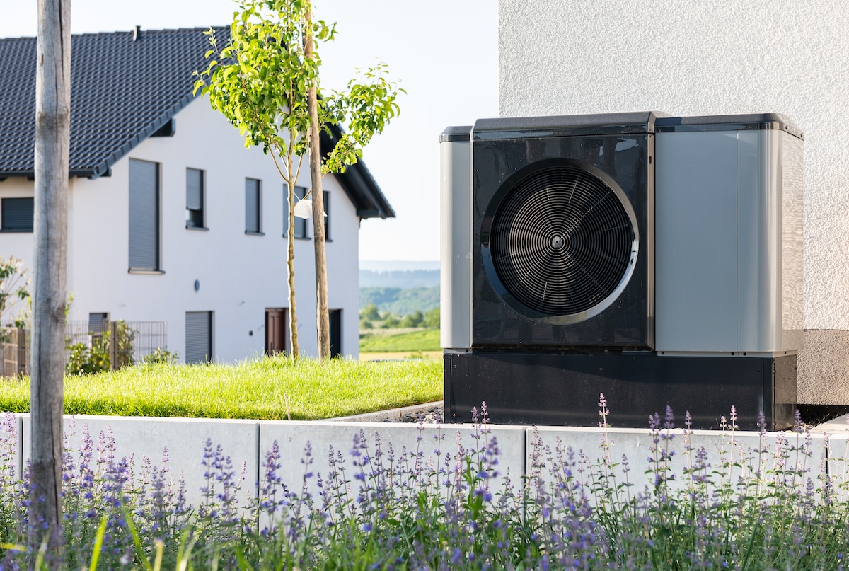 A heat pump in the garden of a single-family house in Baden-Württemberg, Rottweil, Germany