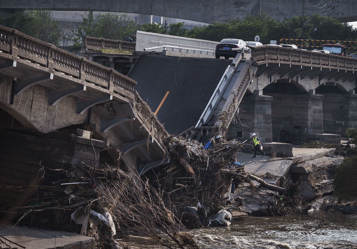 A collapsed bridge caused by flash flooding in Beijing, China