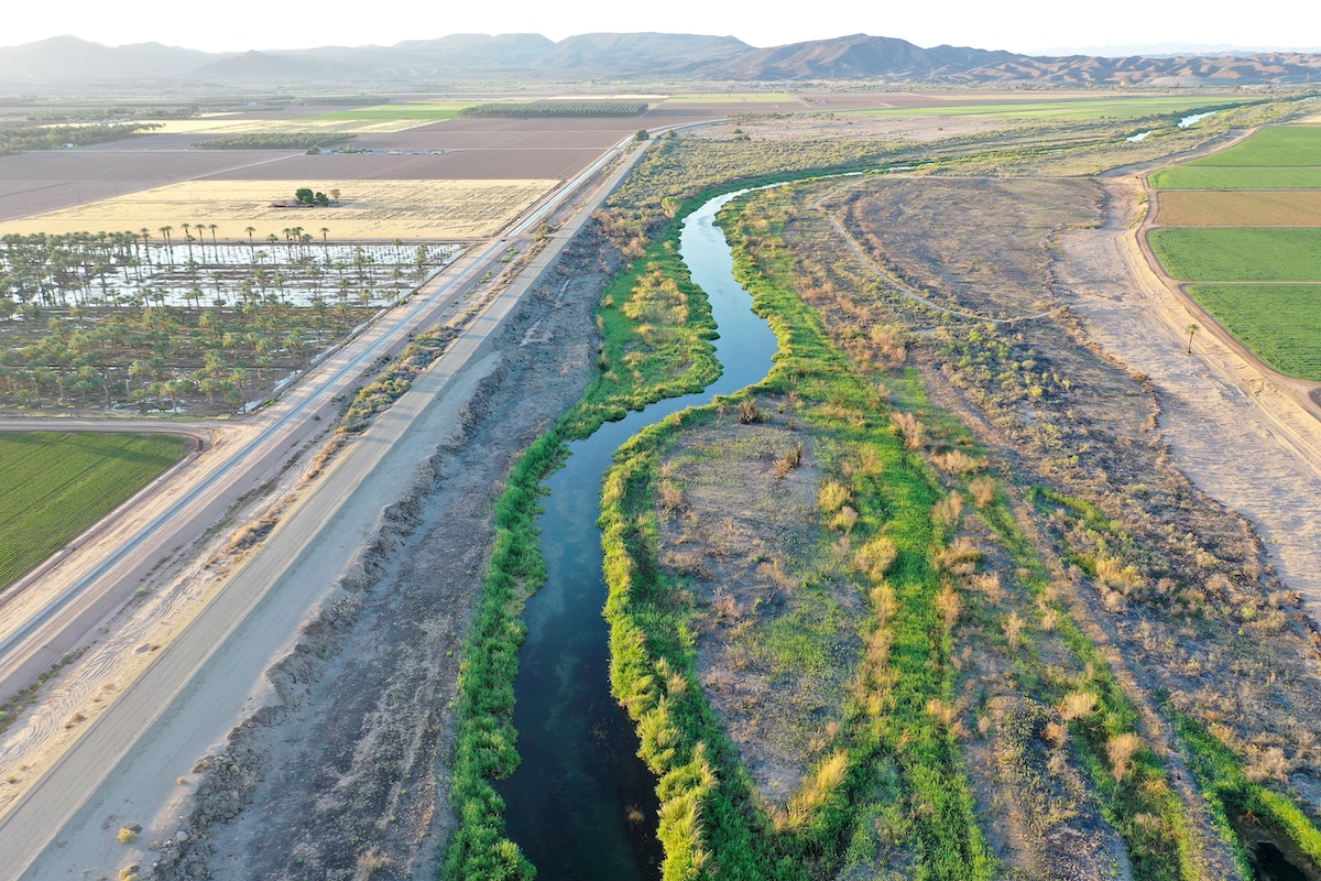 Aerial view of the long-depleted Colorado River flowing along the border between California and Arizona