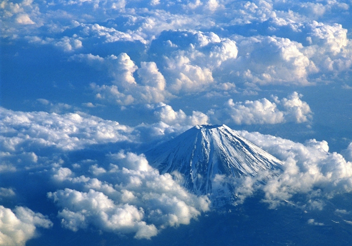 Aerial view of clouds surrounding Japan's Mount Fuji