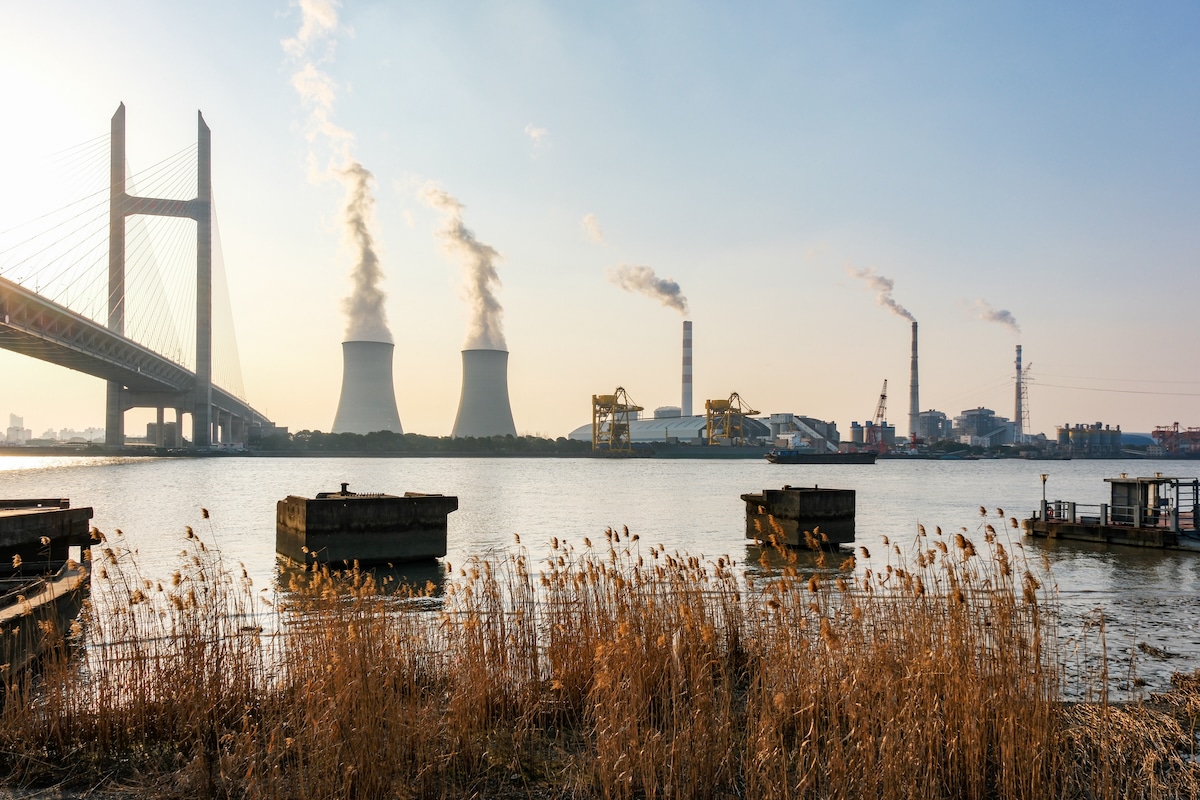 The Wujing coal-fired power plant and MinPu bridge in Shanghai, China