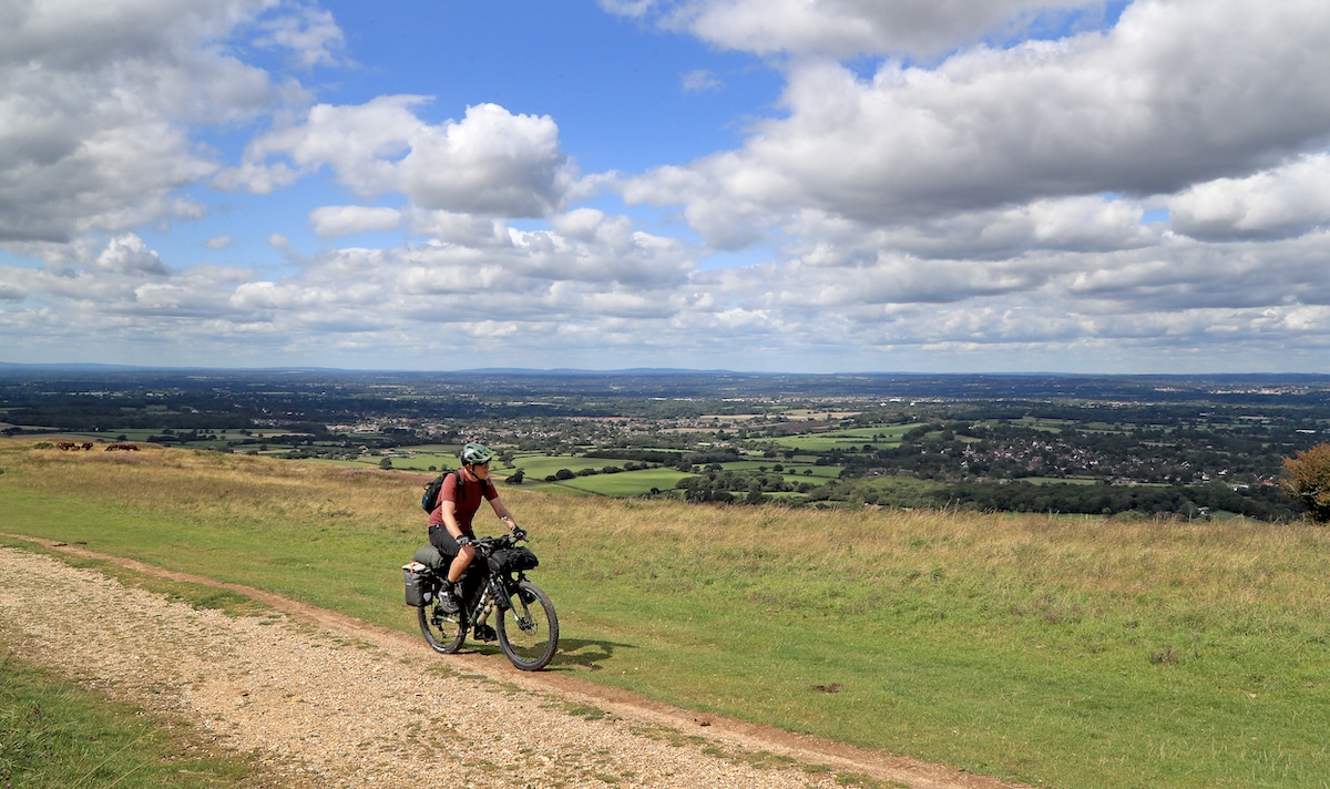 A man cycles in South Downs National Park near Brighton, East Sussex, England