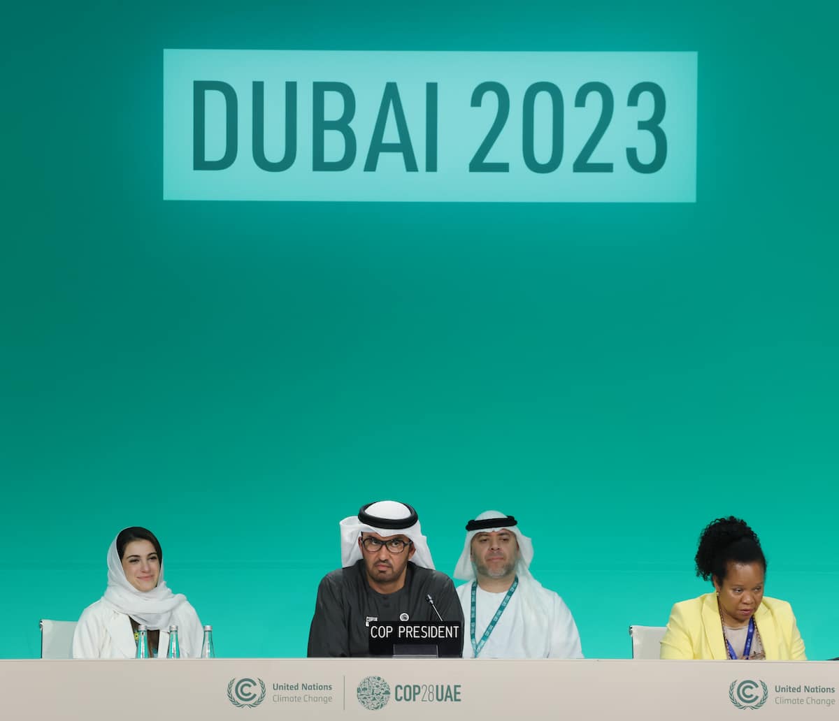 Sultan Ahmed Al Jaber, president of the COP28 UNFCCC Climate Conference, and Majid Al-Suwaidi, director general of the COP28, attend a plenary session on day eleven of the conference as negotiations go into their final phase.