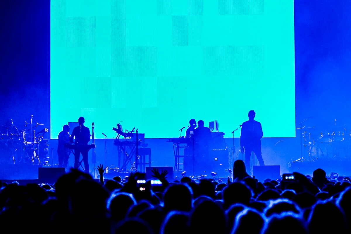 Robert Del Naja and Grant Marshall (aka Daddy G) of Massive Attack perform on stage at The Steel Yard in Bristol, England
