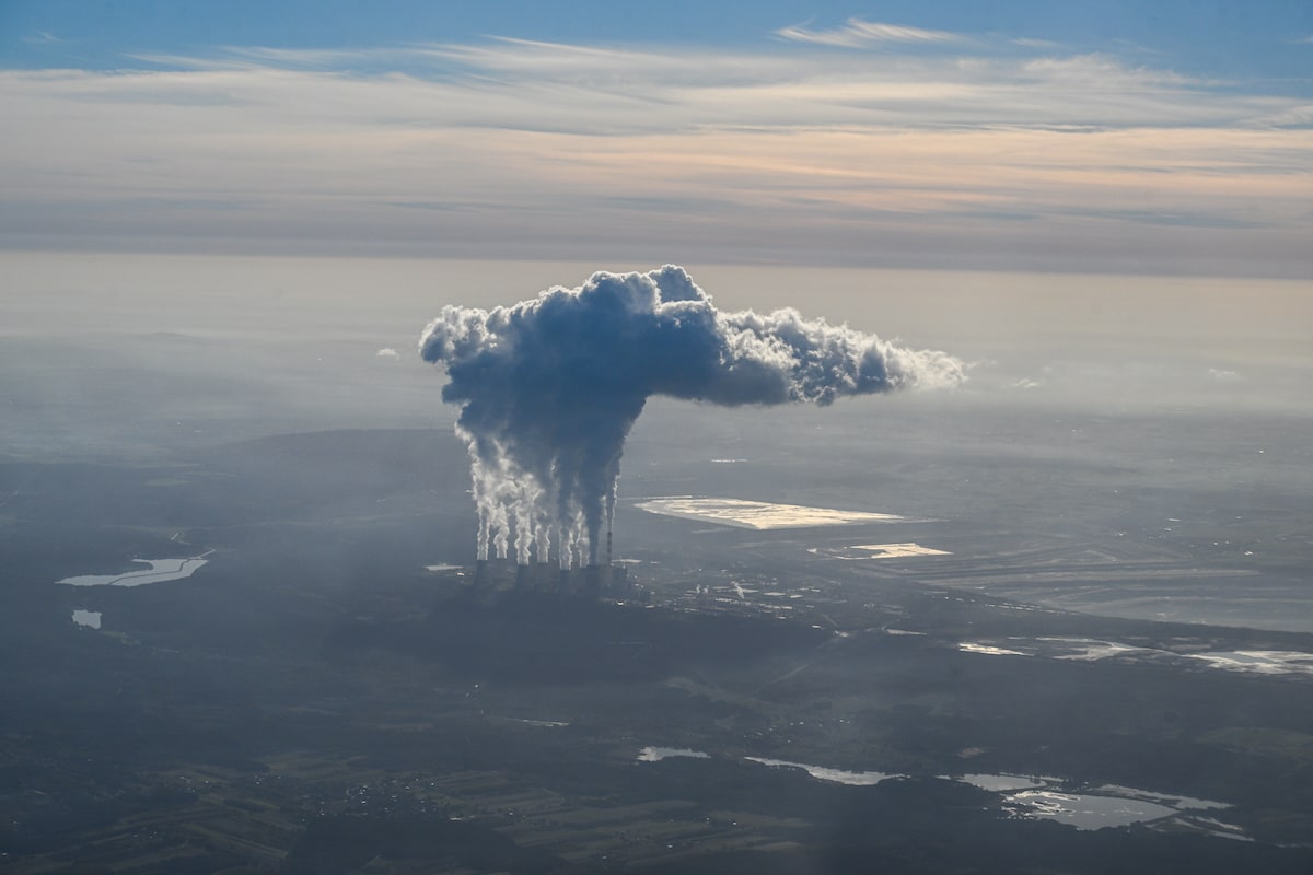 Aerial view of steam and smoke rising from the Belchatow Coal Powered Station in Poland, the world's largest lignite coal-fired power station