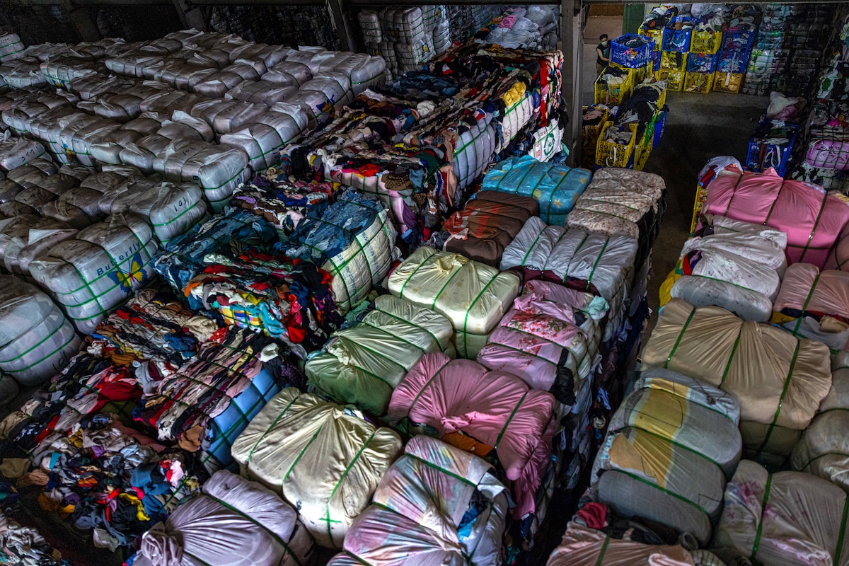 Bales of sorted second-hand clothes at a textile recycling factory in New Taipei City, Taiwan