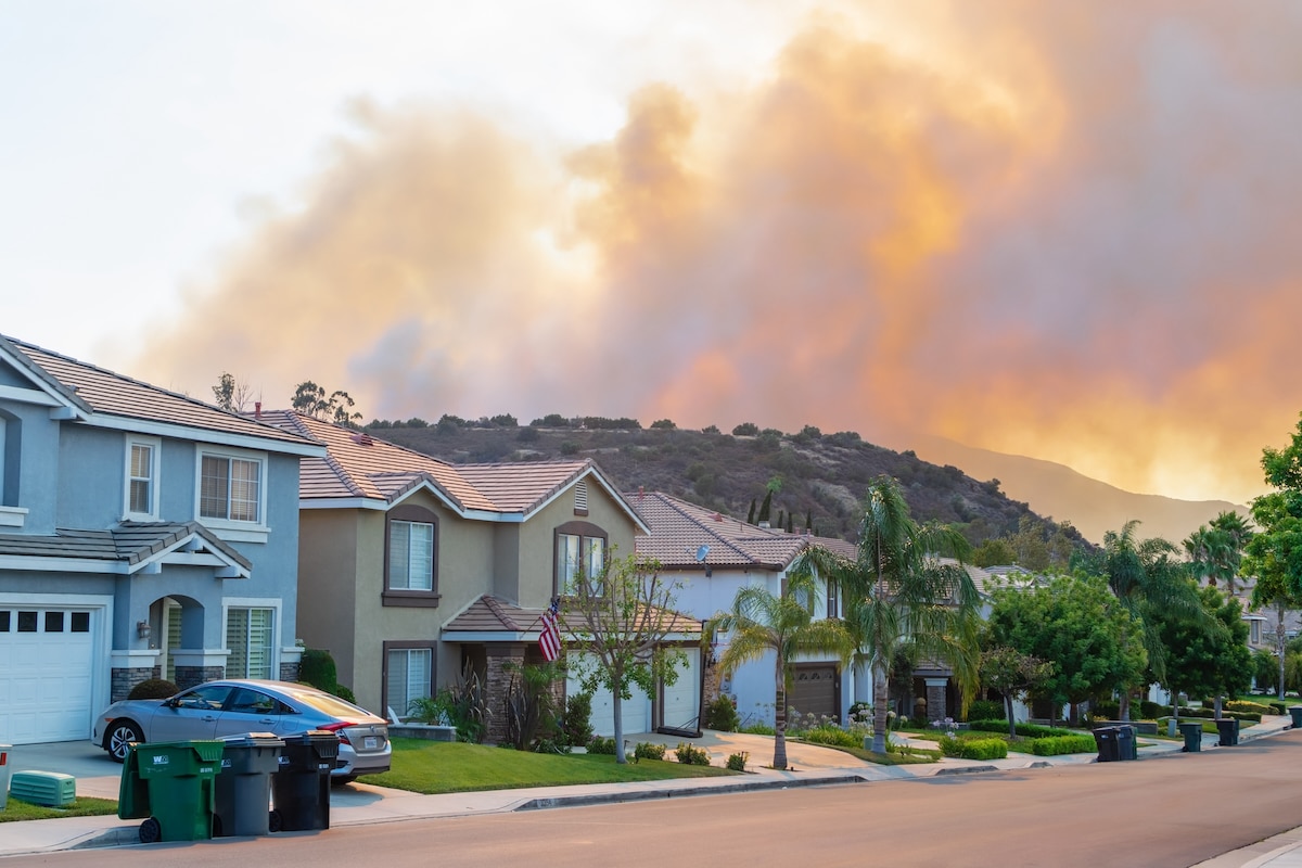 Wildfire smoke near homes in Corona, California