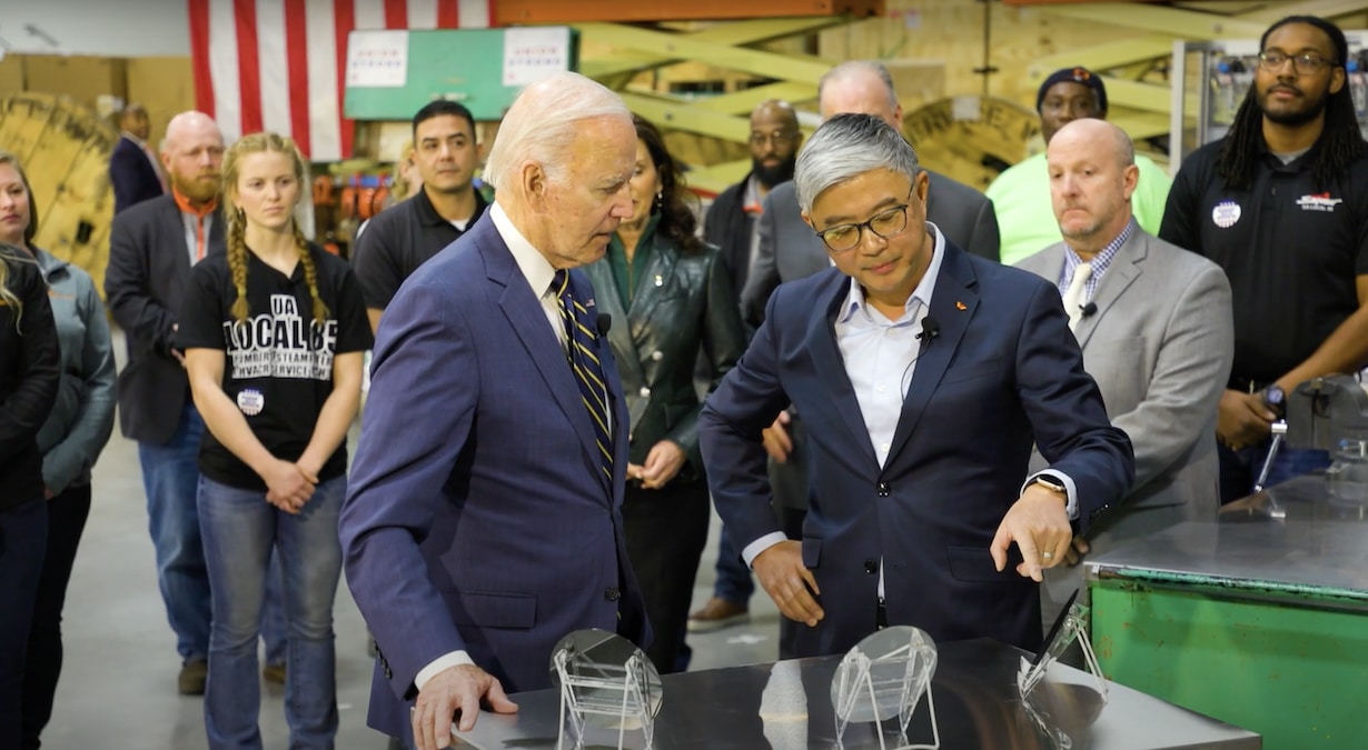 President Joe Biden takes a tour of the SK Siltron CSS facility in Bay City, Michigan with CEO Jianwei Dong