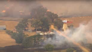 Thousands Evacuated as Australia Bushfire Burns Out of Control