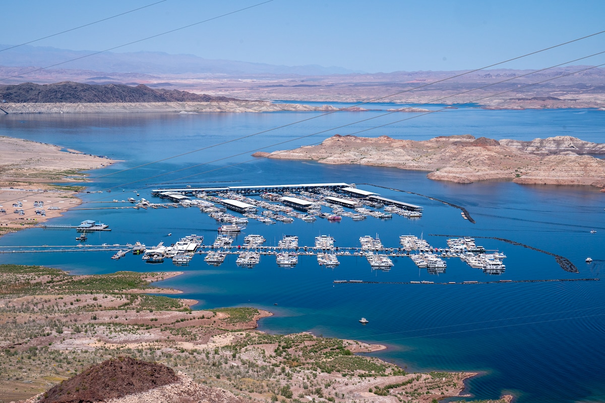 Boats docked along the shores of the Colorado River forming Lake Mead in Boulder City, Nevada