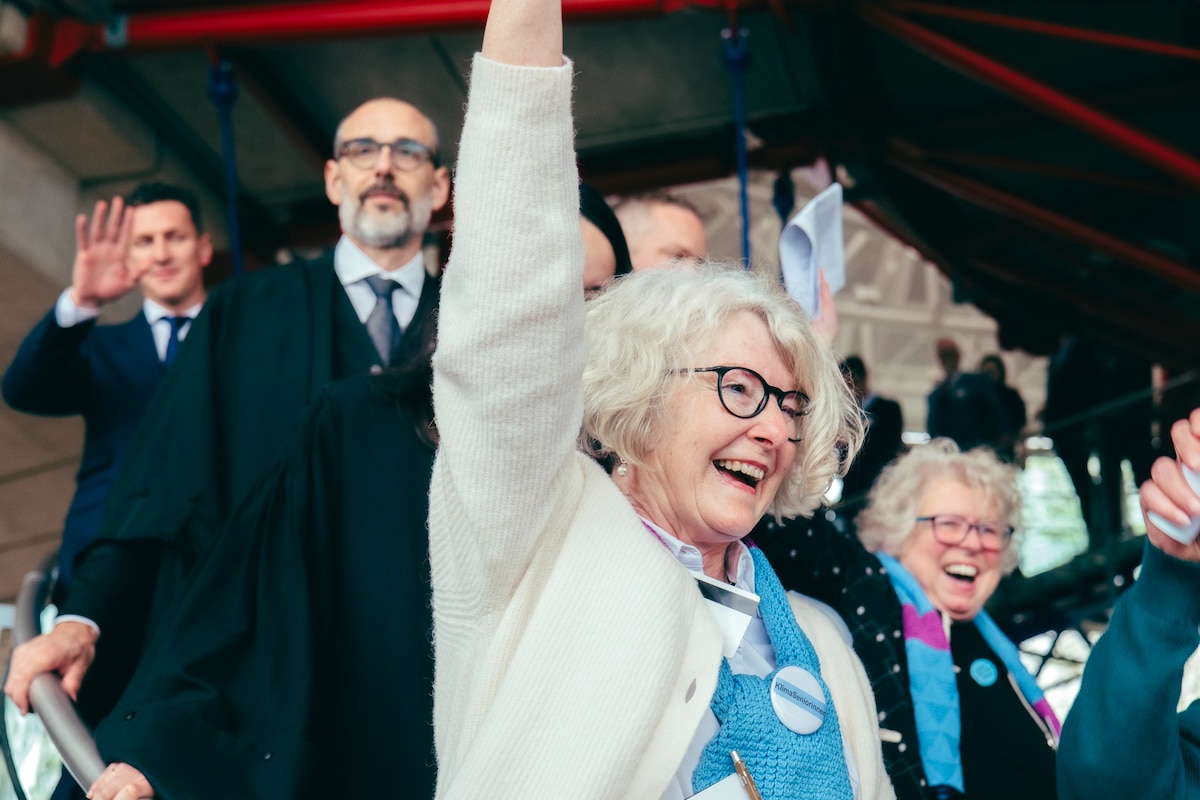 Members of KlimaSeniorinnen celebrate the historic ruling by the European Court of Human Rights that Switzerland’s inaction on climate change violated the human rights of its country’s citizens